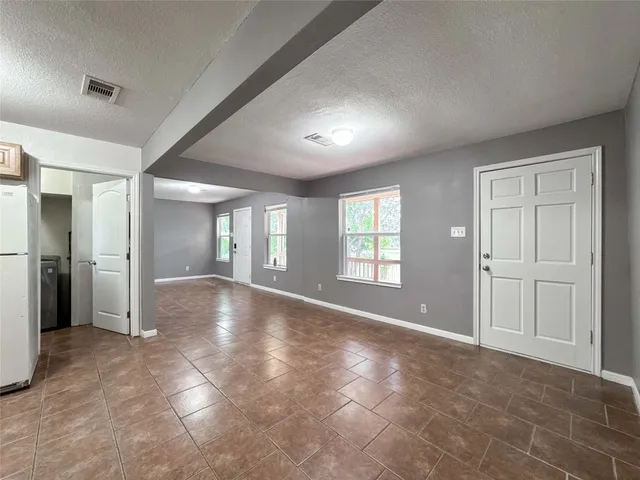 a view of a livingroom with a staircase