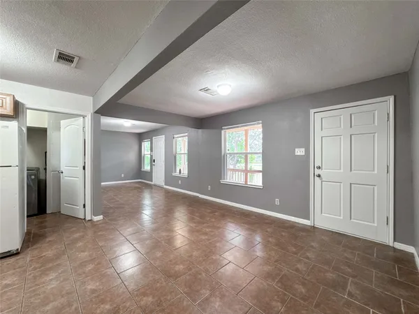 a view of a livingroom with a staircase