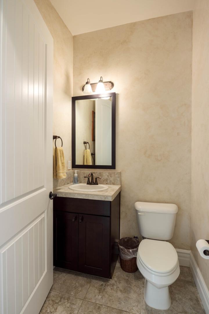 7230 Pitlochry Drive Gilroy, CA 95020 - Photo 31 of 74 a bathroom with a toilet sink and mirror