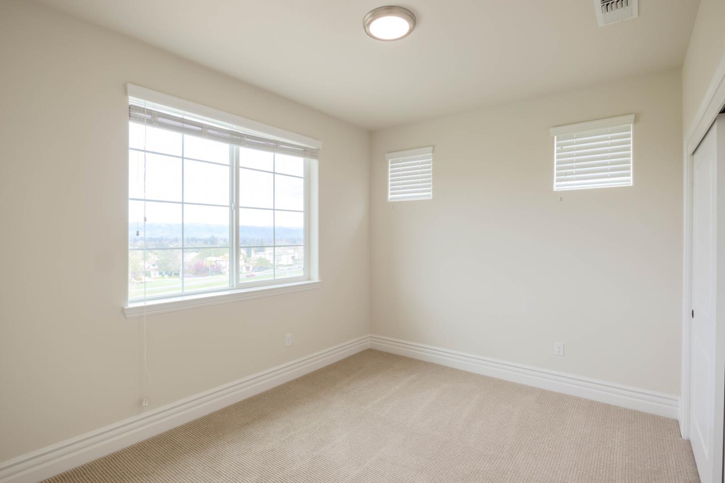 7230 Pitlochry Drive Gilroy, CA 95020 - Photo 62 of 74 an empty room with a window