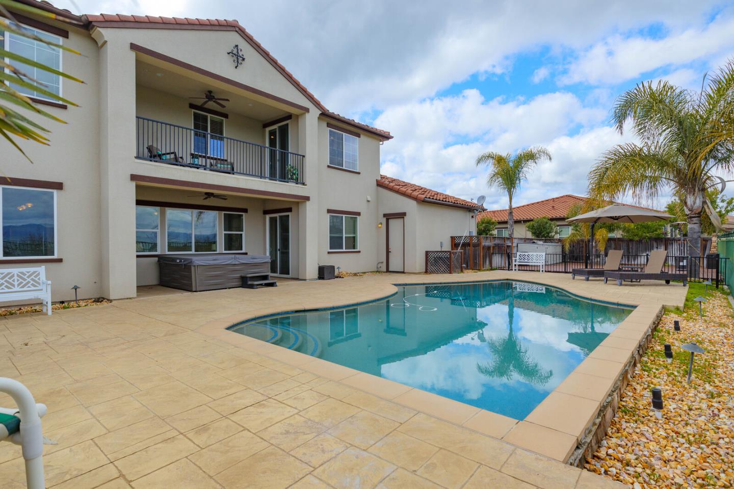 7230 Pitlochry Drive Gilroy, CA 95020 - Photo 65 of 74 a view of a patio with swimming pool table and chairs
