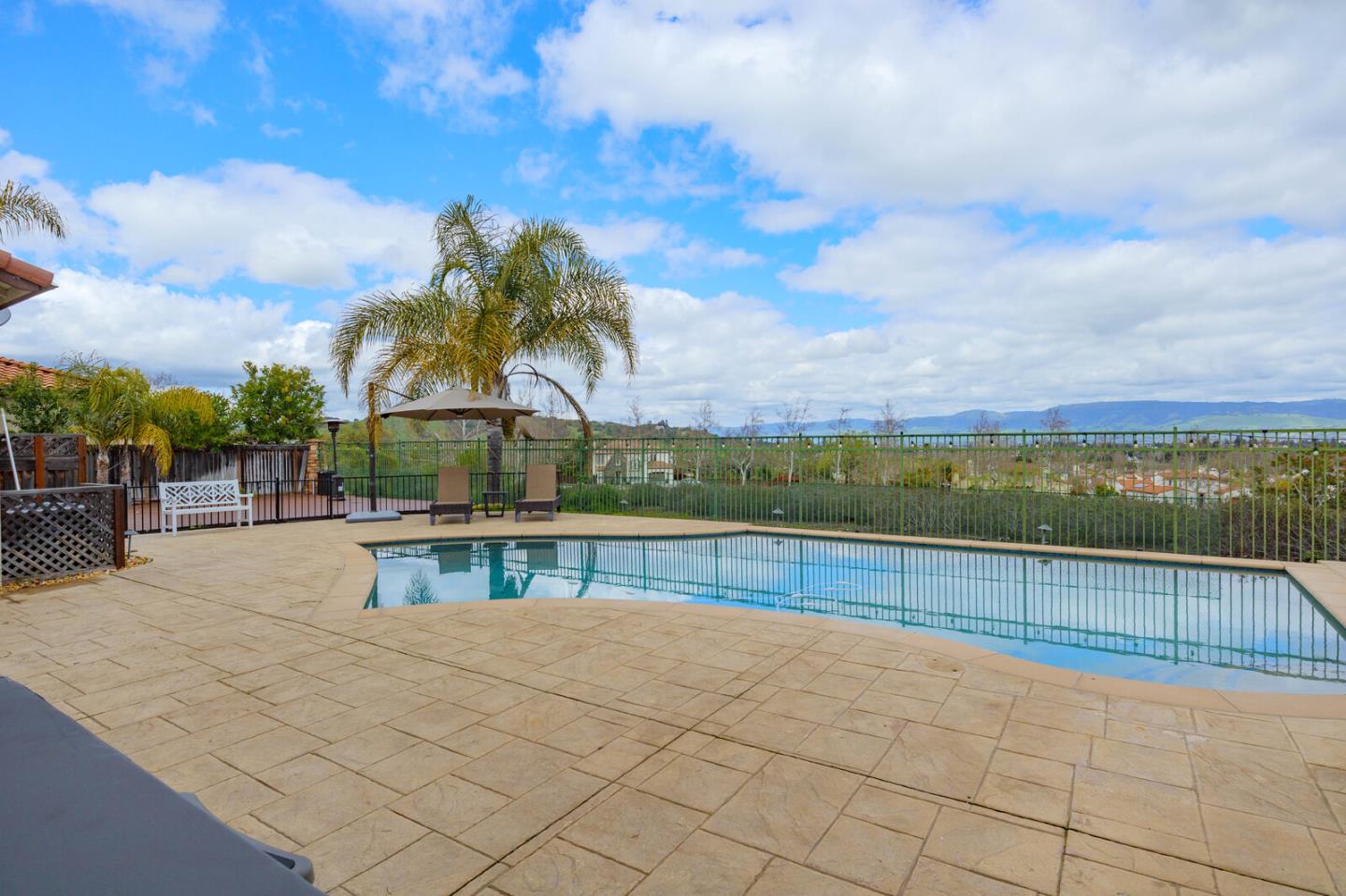 7230 Pitlochry Drive Gilroy, CA 95020 - Photo 66 of 74 a view of swimming pool with outdoor seating and city view