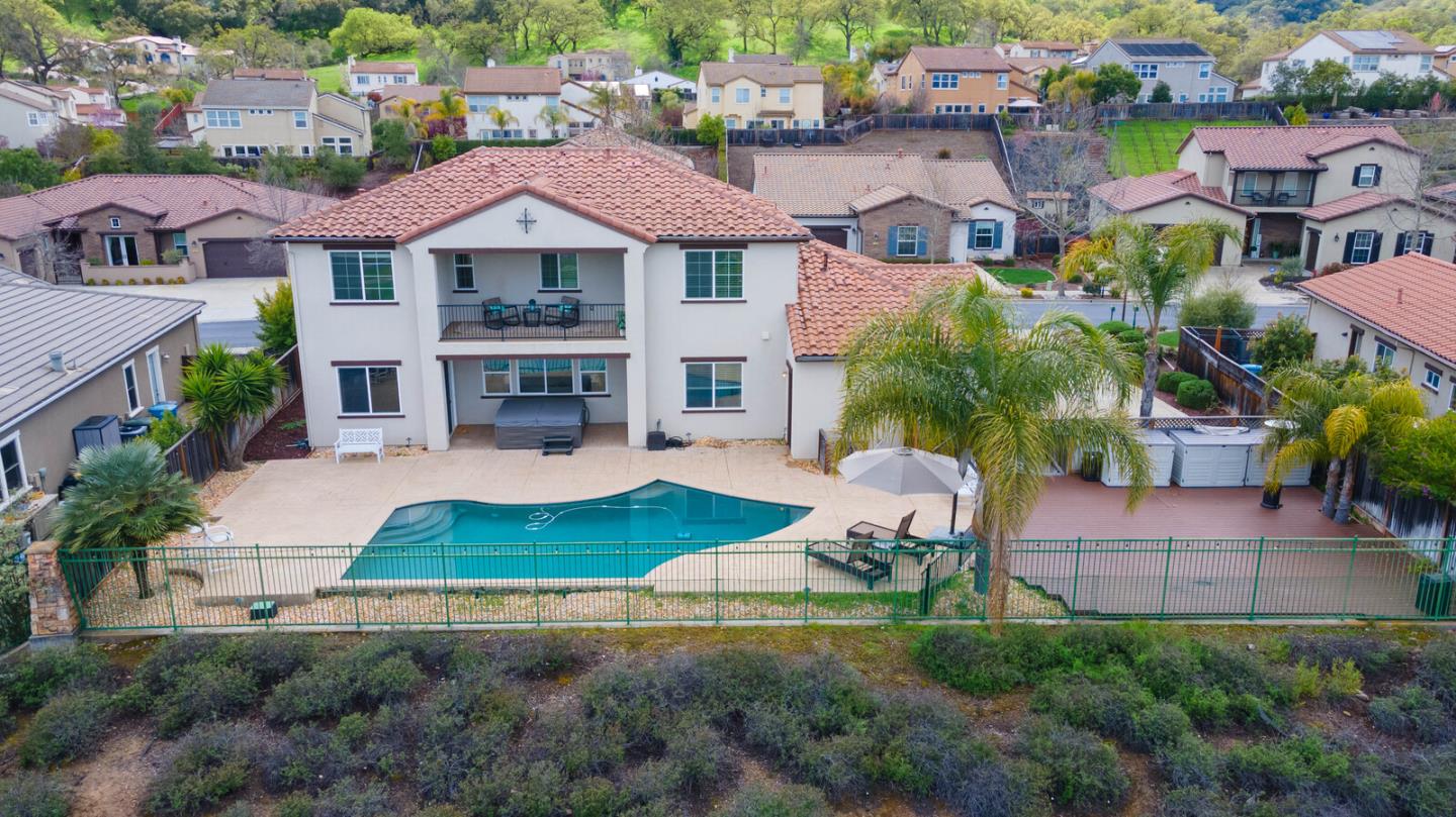 7230 Pitlochry Drive Gilroy, CA 95020 - Photo 7 of 74 an aerial view of a house with yard and lake view