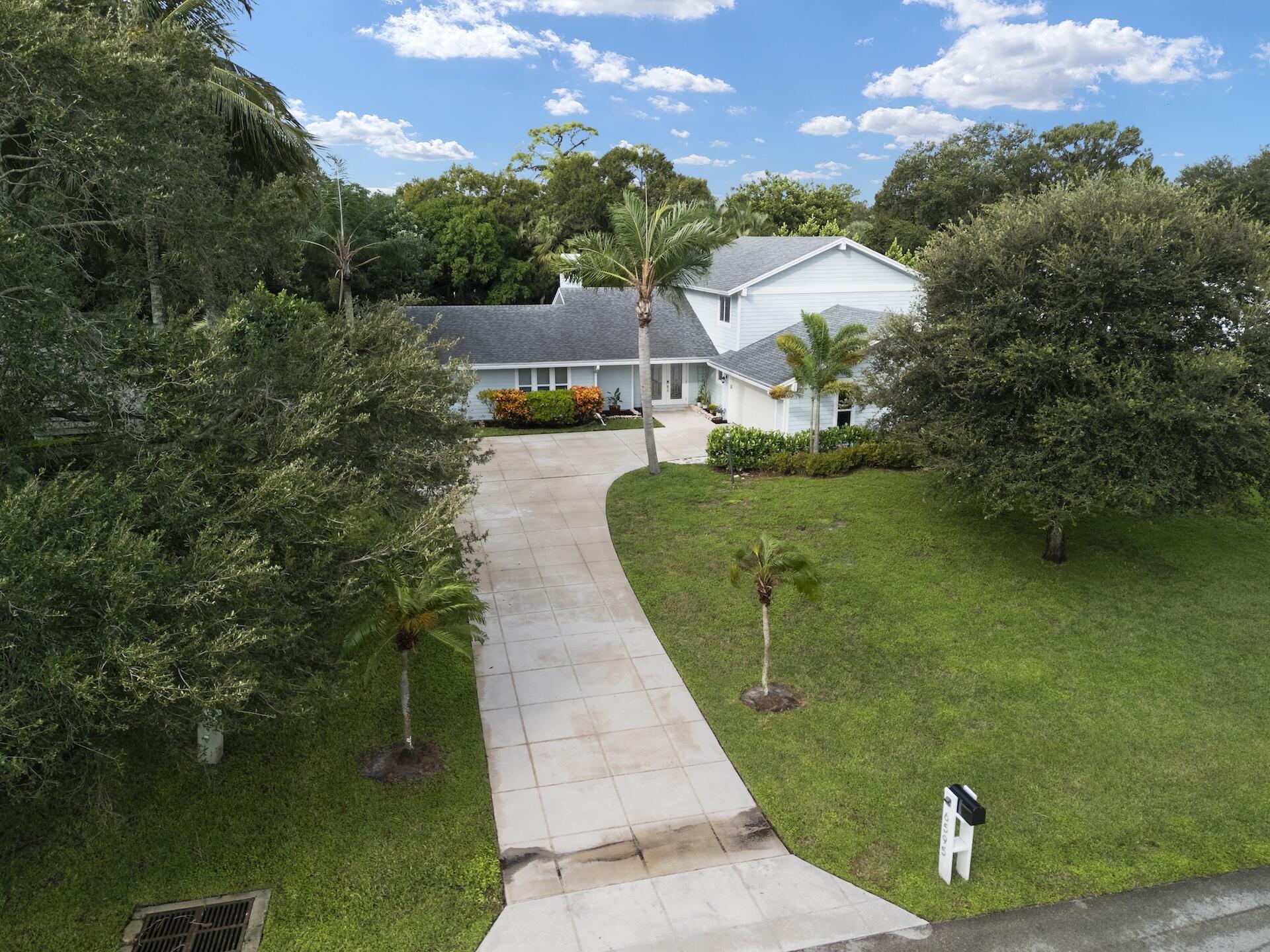 6595 Wood Lake Road Jupiter, FL 33458 - Photo 46 of 54 an aerial view of a house