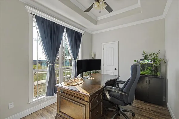 a workspace with furniture and window