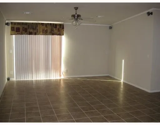 a kitchen with granite countertop cabinets stainless steel appliances and a counter space