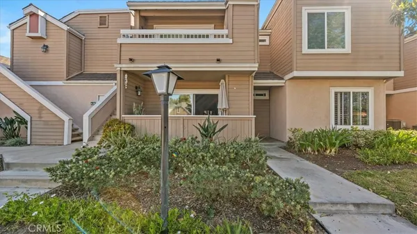 front view of a house with a small yard