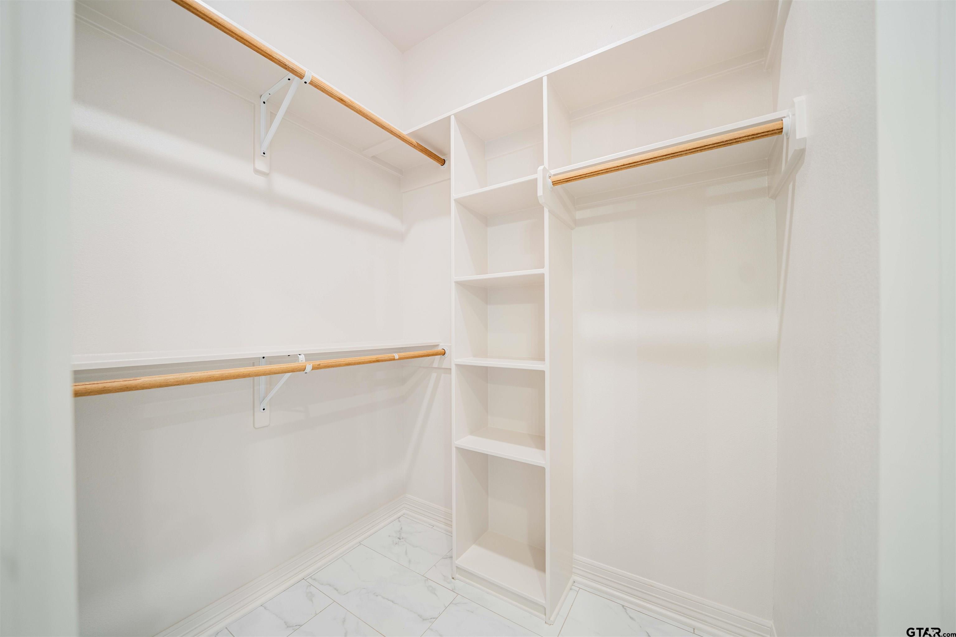 1203 Penny Lane Kilgore, TX 75662 - Photo 15 of 24 a view of an empty walk in closet