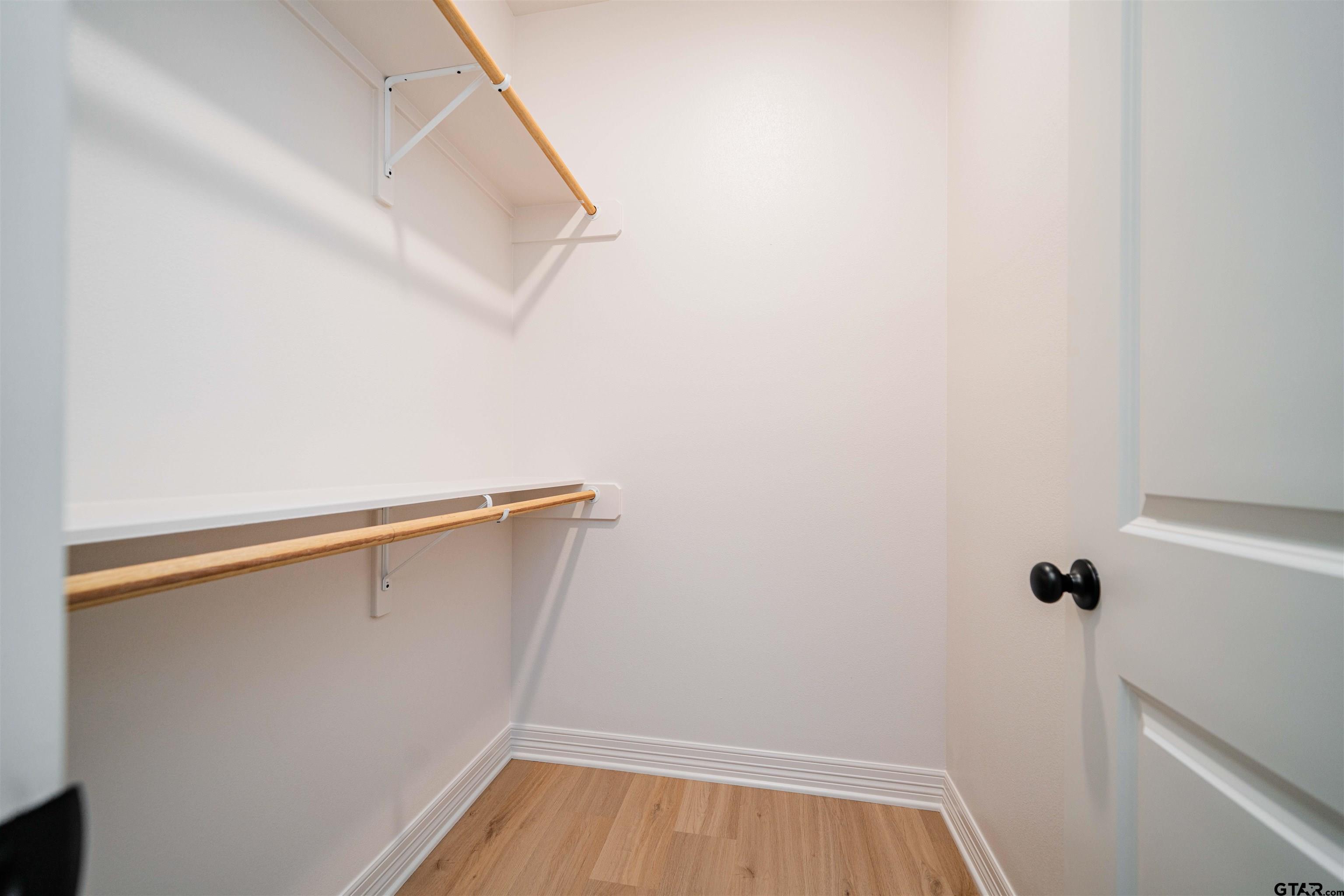 1203 Penny Lane Kilgore, TX 75662 - Photo 17 of 24 a view of small space with racks on the wall