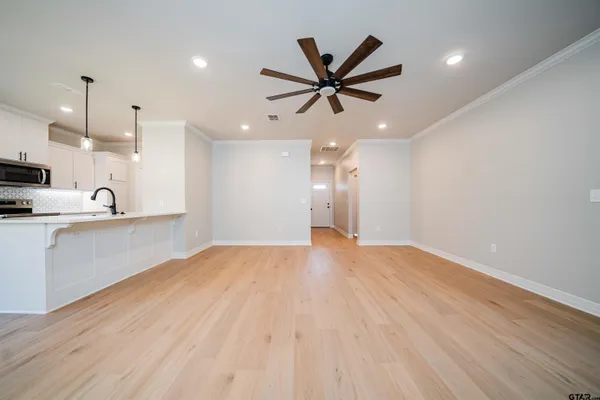 a view of a kitchen with a sink and dishwasher