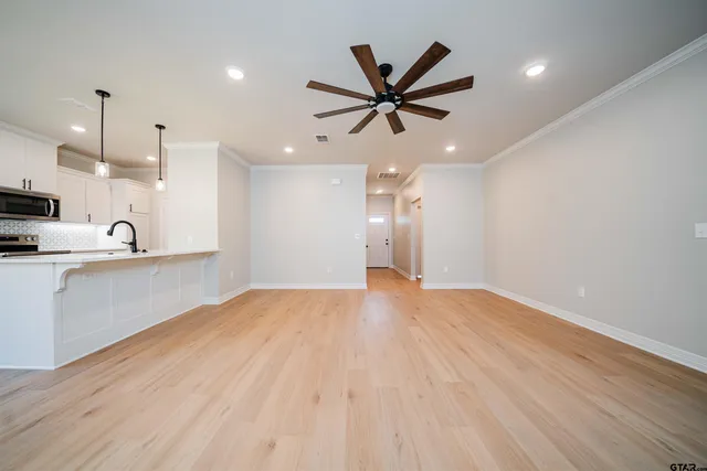 a view of a kitchen with a sink and dishwasher