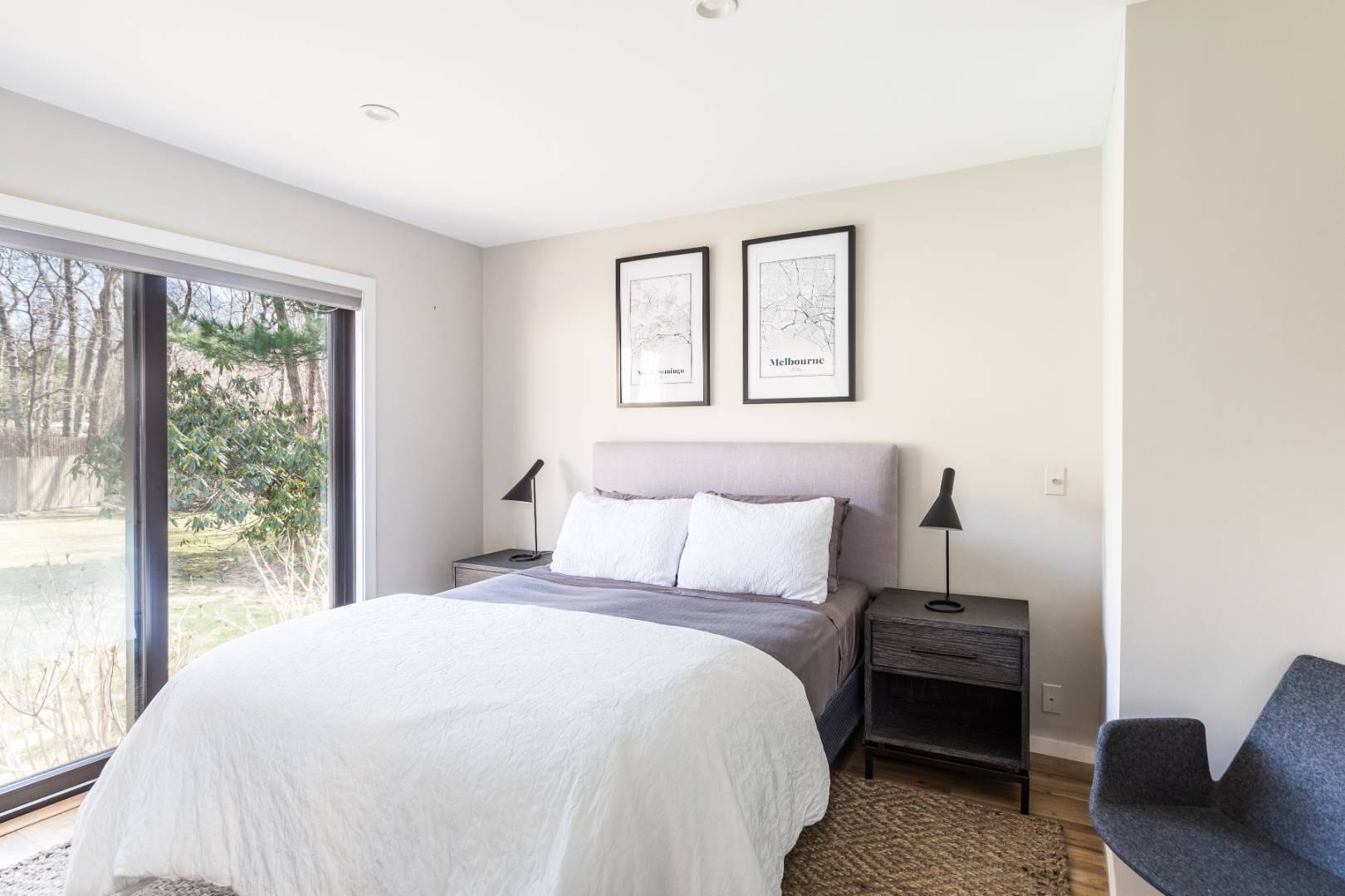 54 Johnson Avenue Southampton, NY 11968 - Photo 16 of 24 a bedroom with a bed and a couch