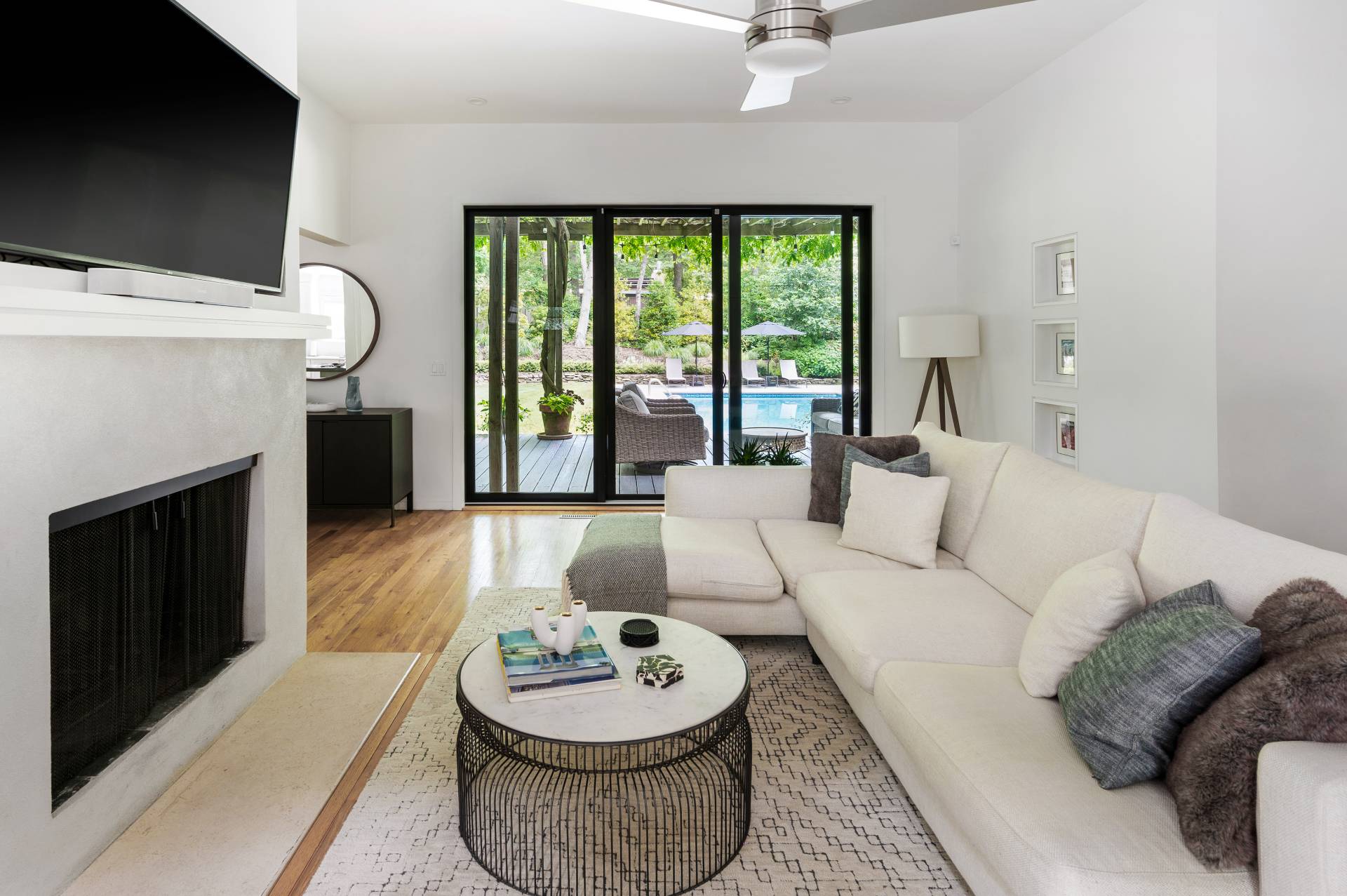 54 Johnson Avenue Southampton, NY 11968 - Photo 8 of 24 a living room with furniture and a fireplace