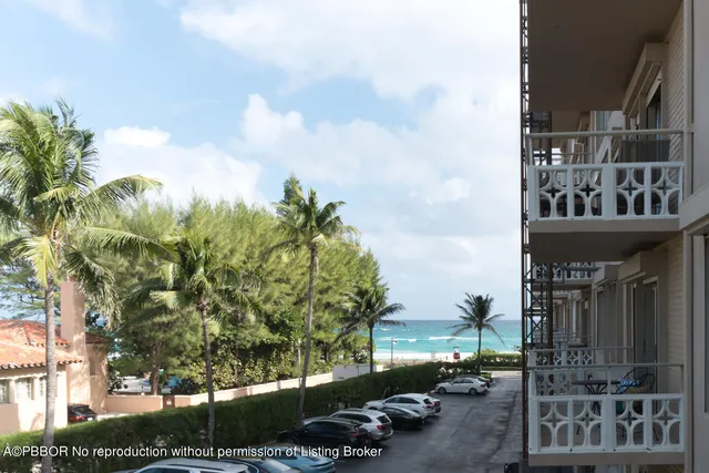 a city street lined with tall buildings