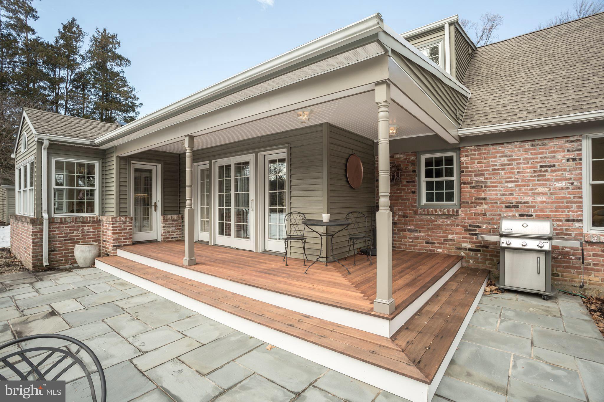 661 Church Road Wayne, PA 19087 - Photo 21 of 32 Mahogany Porch and Flagstone Patio