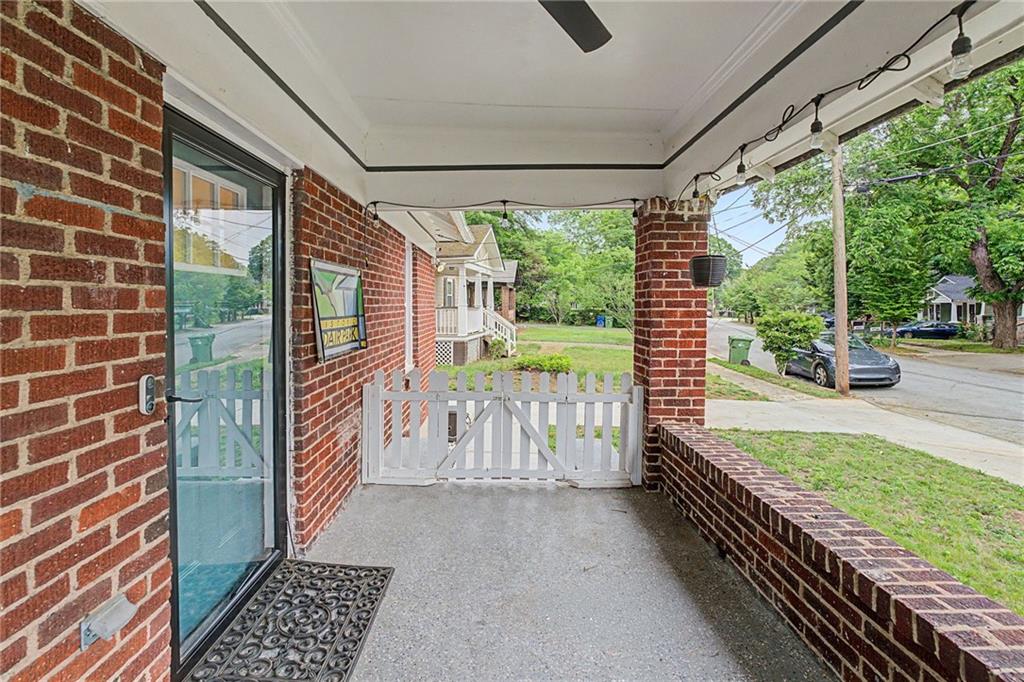 827 Elbert Street Southwest Atlanta, GA 30310 - Photo 30 of 33 a view of a porch with wooden floor
