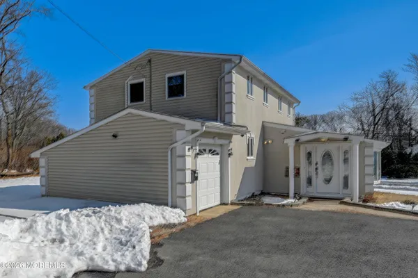 a view of a house with a garage