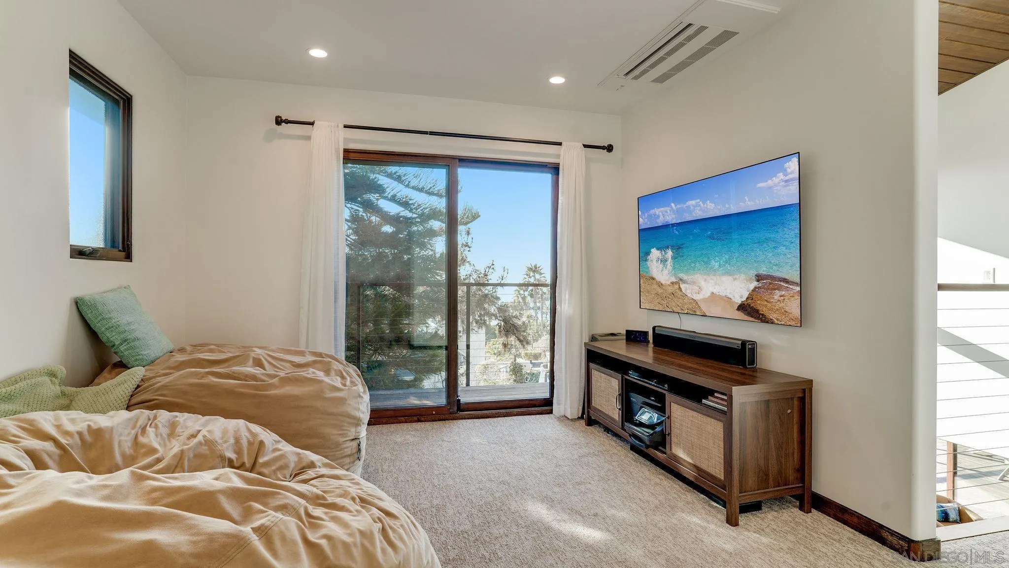320 Del Mar Heights Road Del Mar, CA 92014 - Photo 35 of 49 a bedroom with a bed and large window