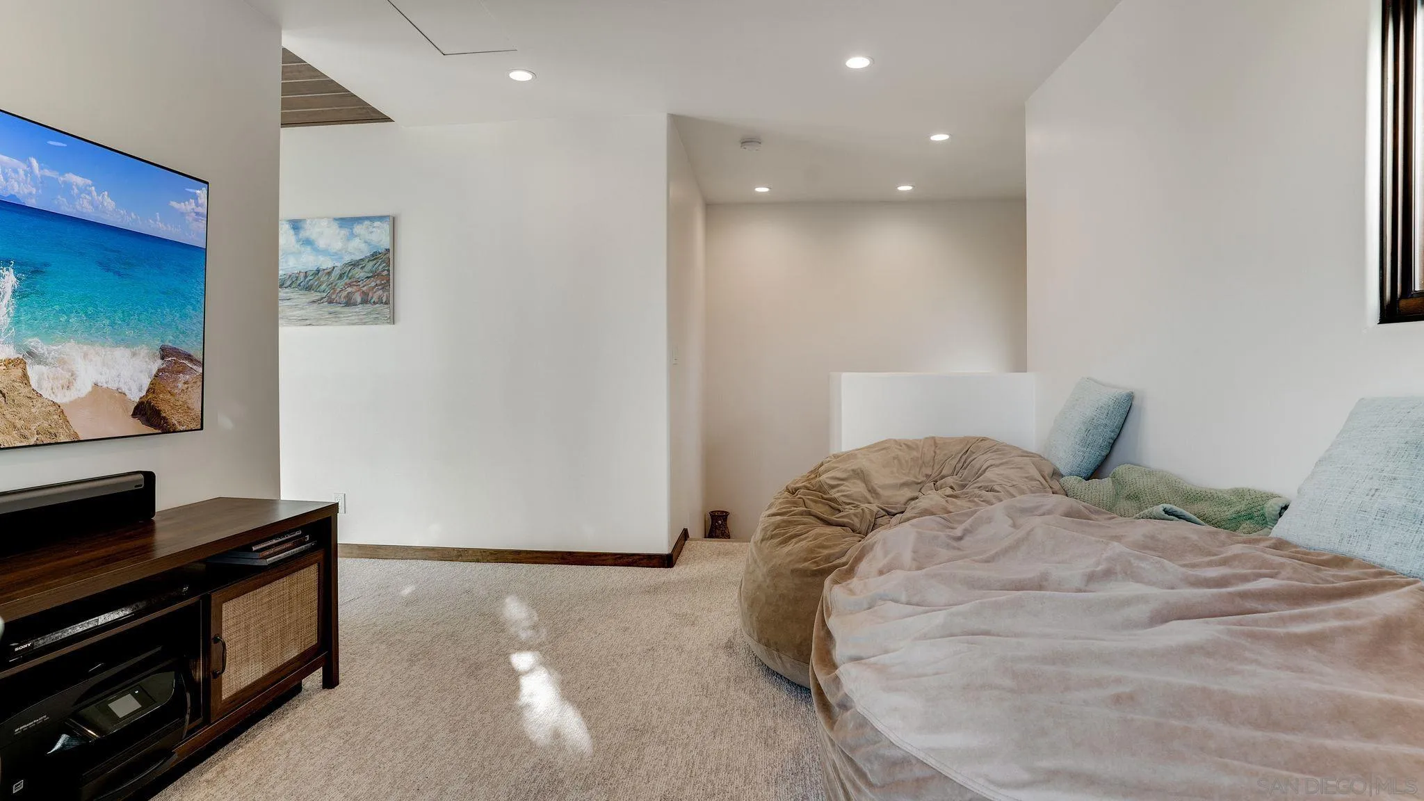 320 Del Mar Heights Road Del Mar, CA 92014 - Photo 37 of 49 a bedroom with a bed and a mirror