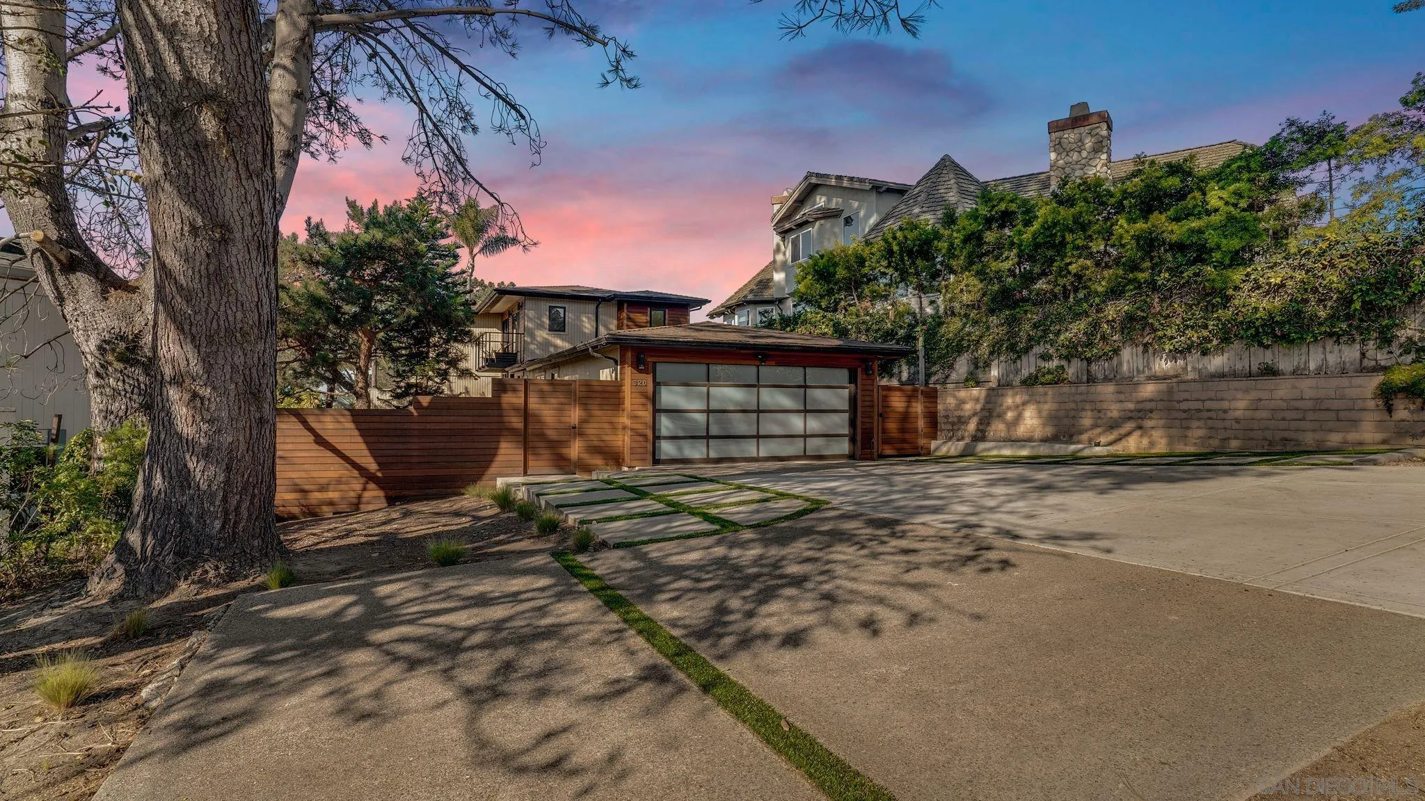 320 Del Mar Heights Road Del Mar, CA 92014 - Photo 8 of 49 a front view of a house with a yard