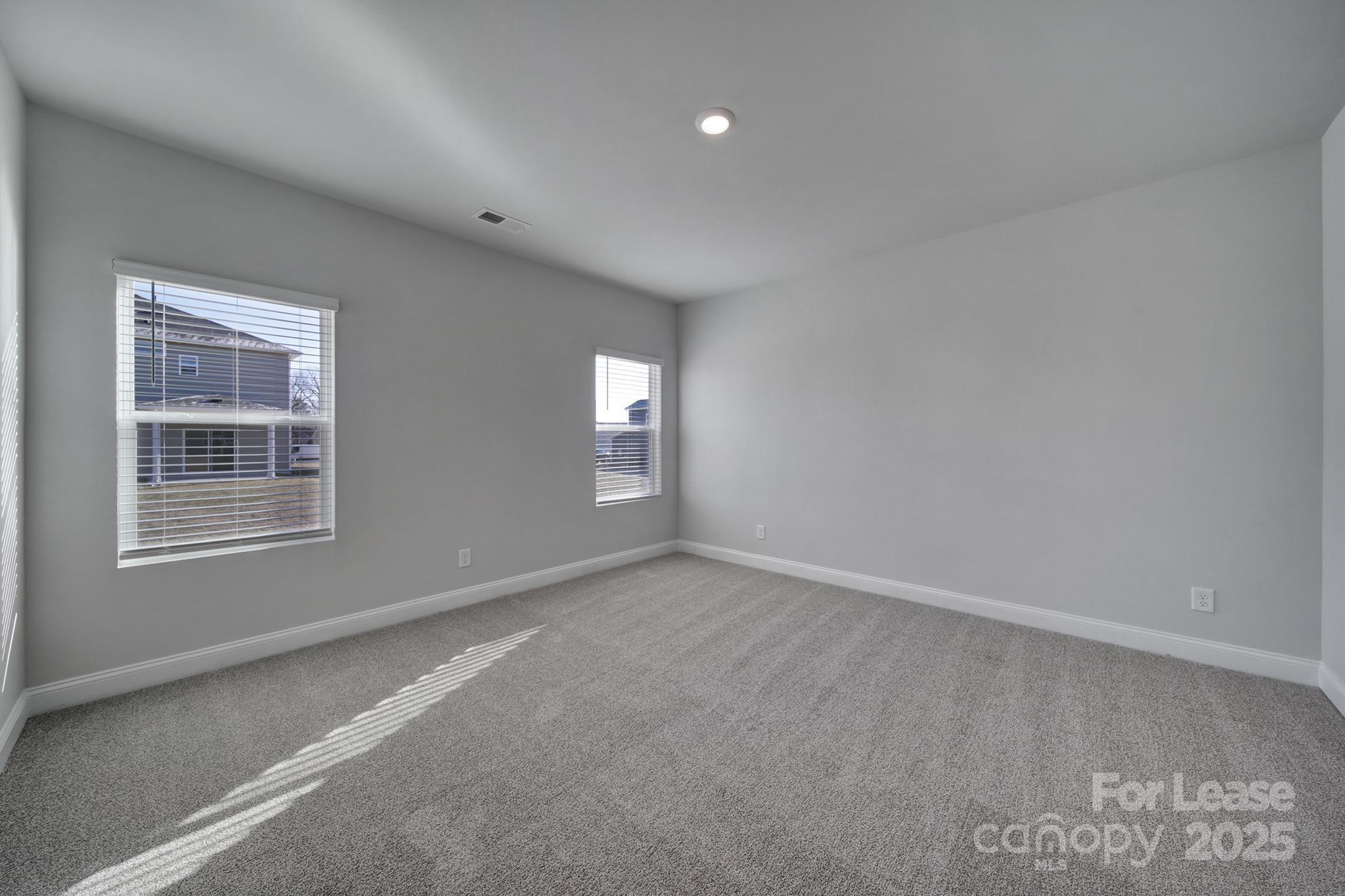 1112 Bradford Pear Road Monroe, NC 28112 - Photo 21 of 33 an empty room with windows