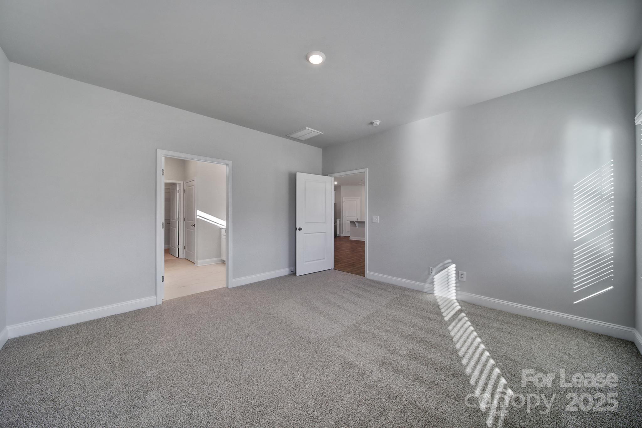 1112 Bradford Pear Road Monroe, NC 28112 - Photo 22 of 33 a view of empty room with wooden floor
