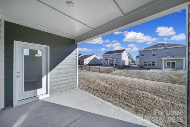 a view of a fireplace in front of house
