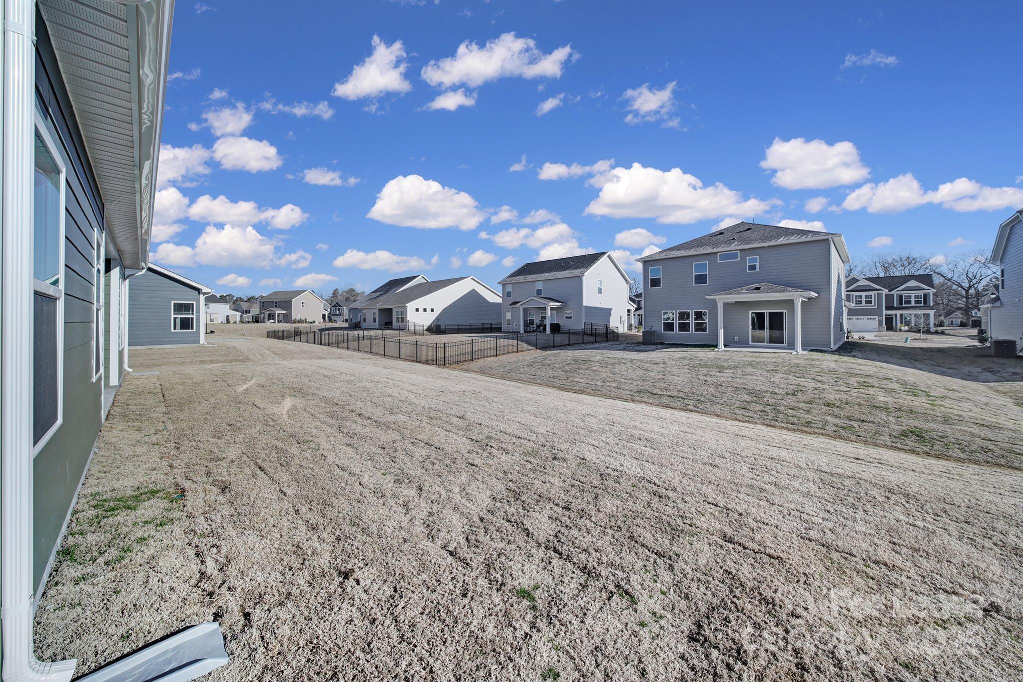1112 Bradford Pear Road Monroe, NC 28112 - Photo 29 of 33 a view of a house with a yard