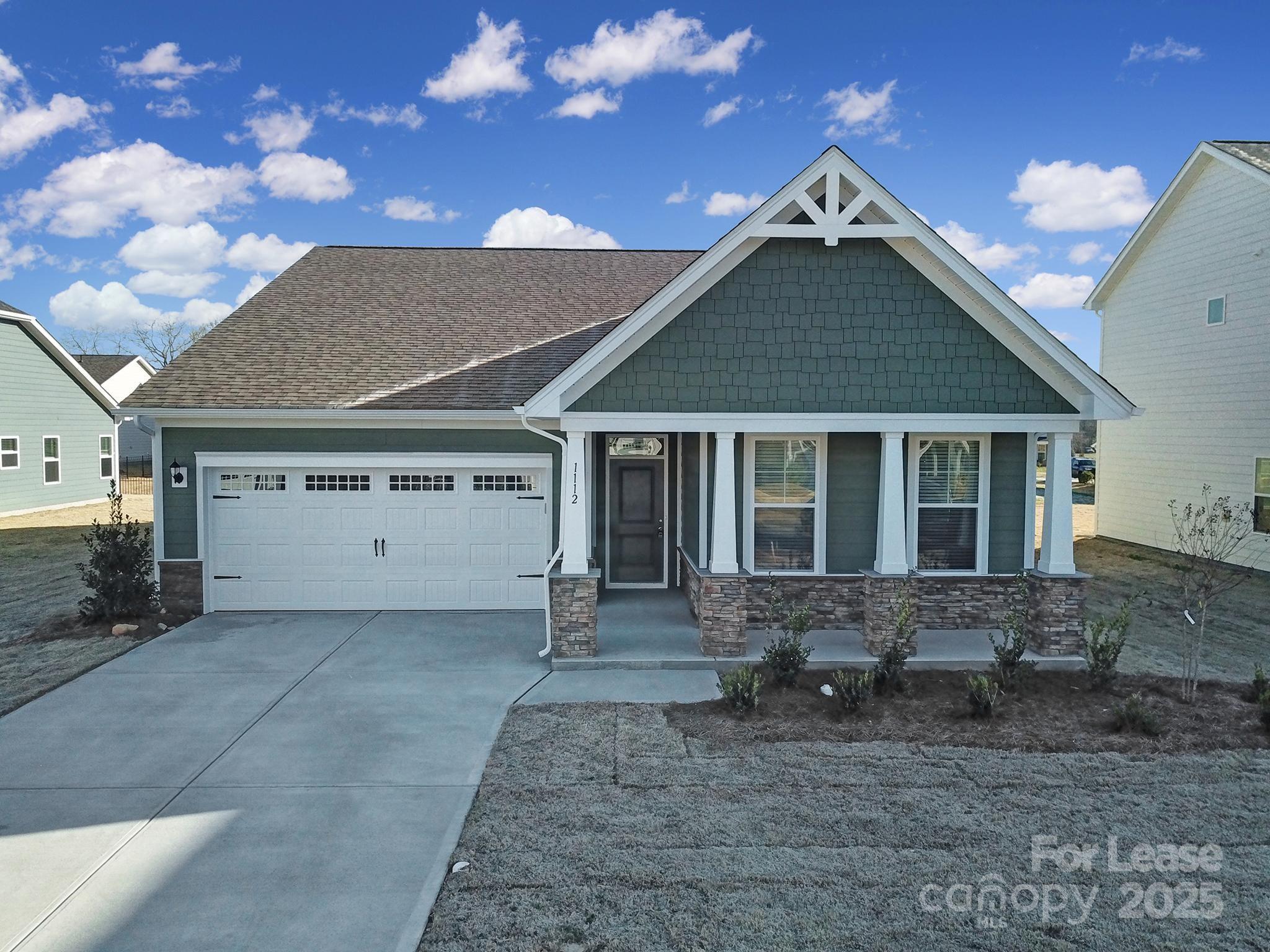 1112 Bradford Pear Road Monroe, NC 28112 - Photo 31 of 33 a view of a house with a yard