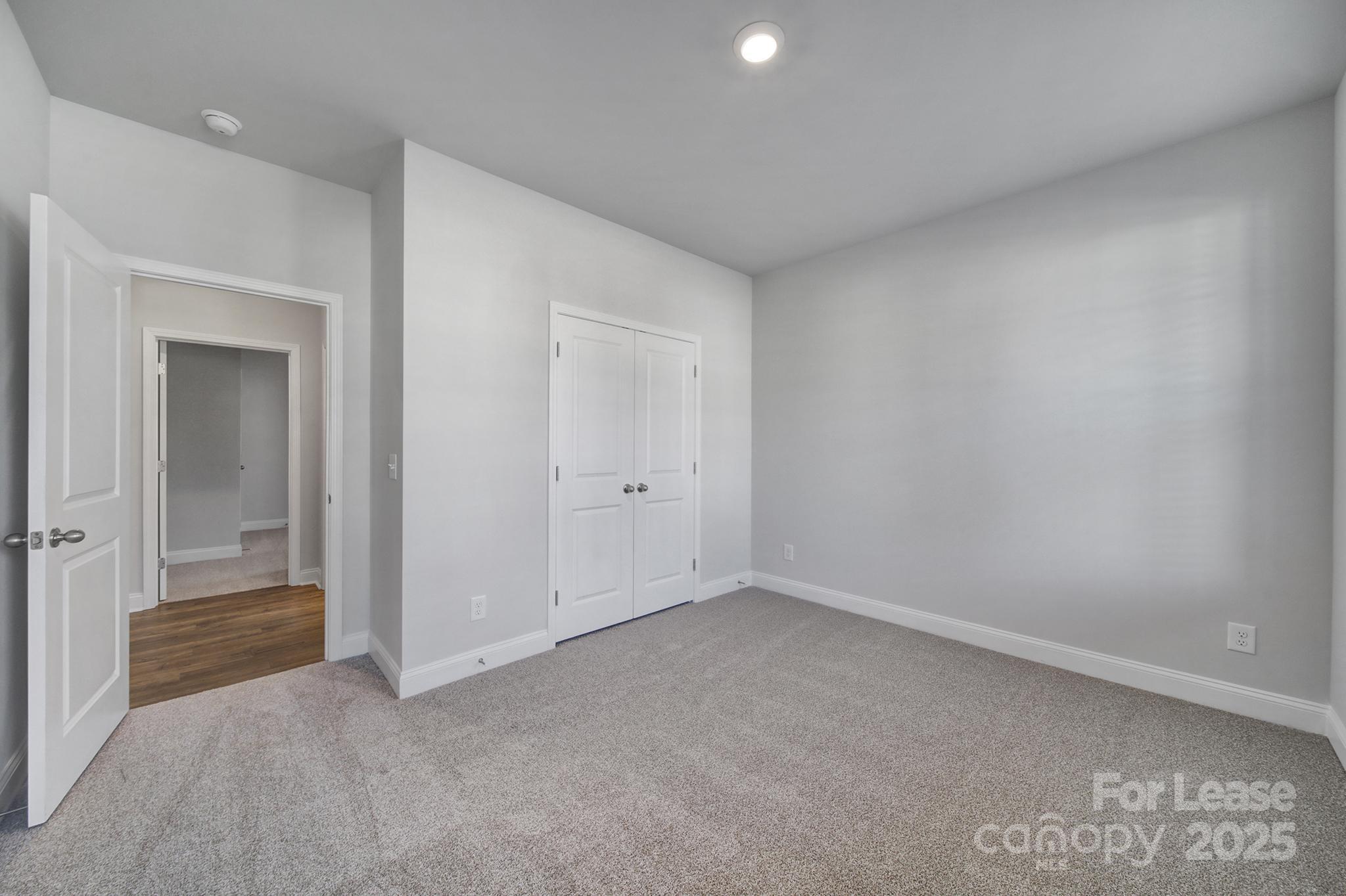 1112 Bradford Pear Road Monroe, NC 28112 - Photo 4 of 33 an empty room with closet area