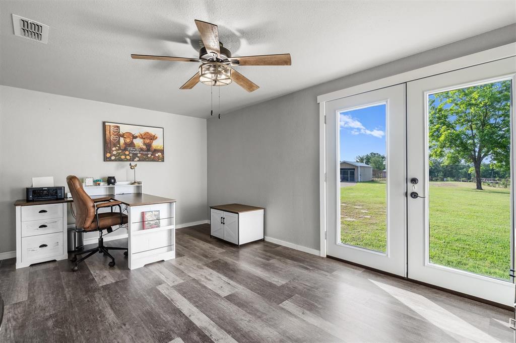 1216 VZ County Road Canton, TX 75103 - Photo 23 of 40 a workspace with wooden floor and a window