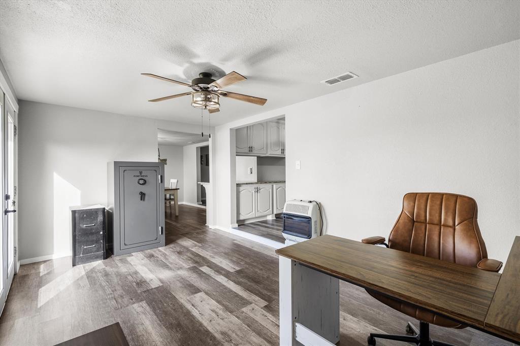 1216 VZ County Road Canton, TX 75103 - Photo 24 of 40 a bedroom with furniture and a chandelier