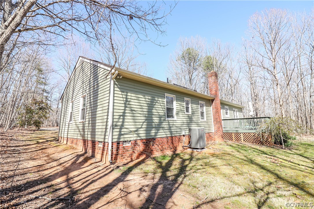 2210 Mill Road Powhatan, VA 23139 - Photo 25 of 36 a view of backyard with a small cabin