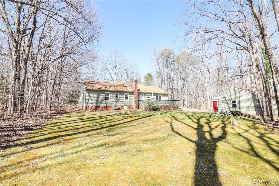2210 Mill Road Powhatan, VA 23139 - Photo 28 of 36 a view of a swimming pool with an outdoor space