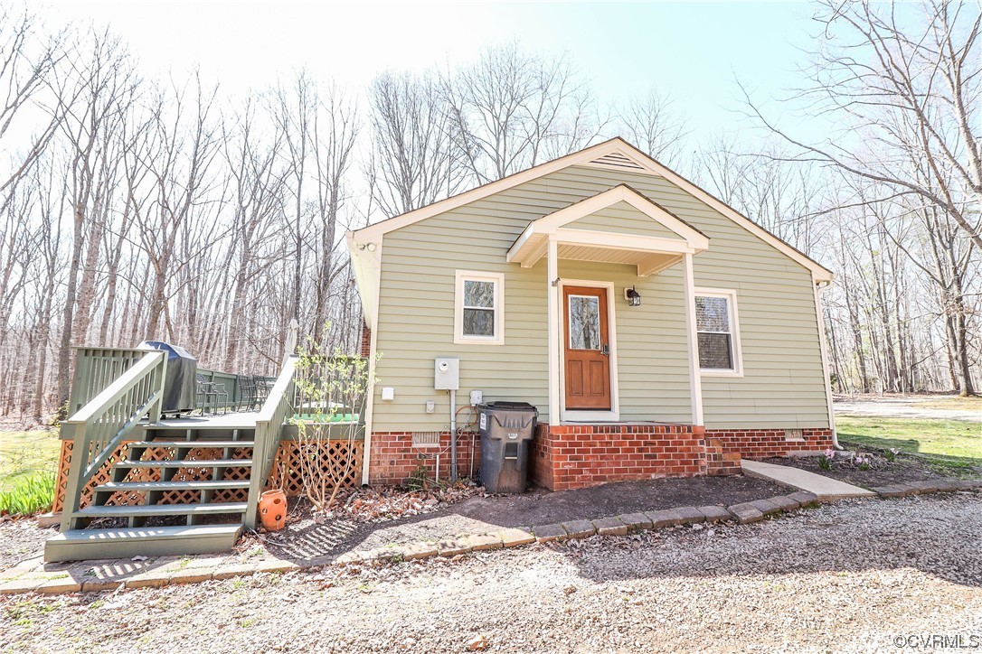 2210 Mill Road Powhatan, VA 23139 - Photo 32 of 36 a view of a house with a yard chairs and refrigerator