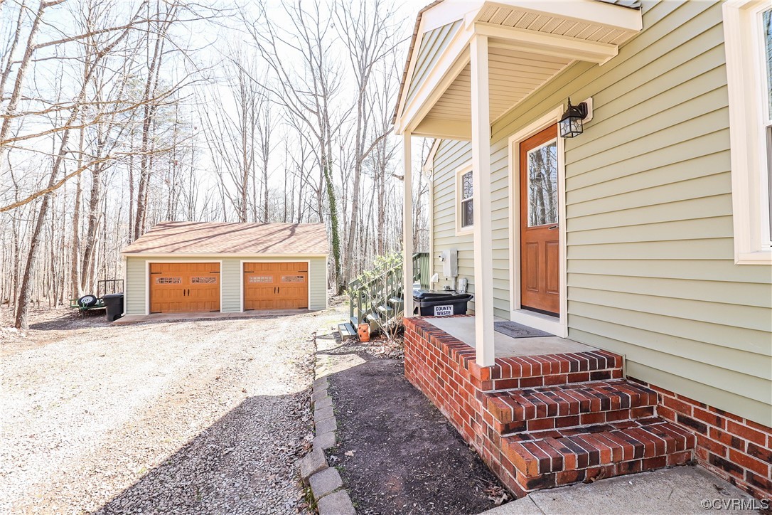 2210 Mill Road Powhatan, VA 23139 - Photo 33 of 36 a front view of a house with a yard