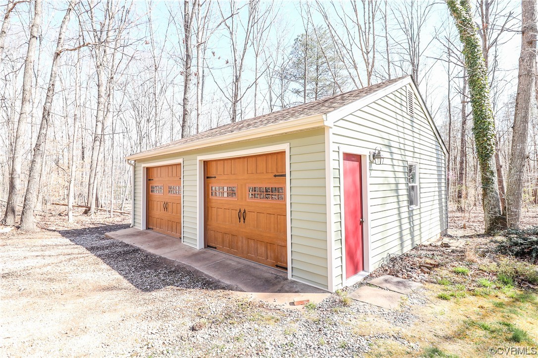 2210 Mill Road Powhatan, VA 23139 - Photo 34 of 36 a view of a house with a snow on the road