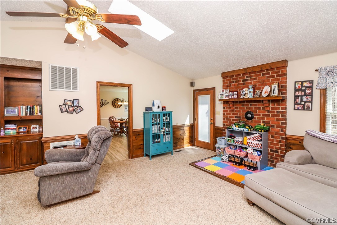 2210 Mill Road Powhatan, VA 23139 - Photo 5 of 36 a living room with furniture and a large window