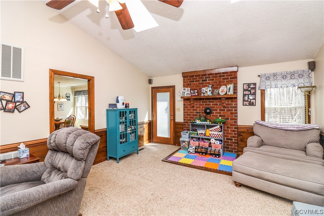 2210 Mill Road Powhatan, VA 23139 - Photo 7 of 36 a living room with furniture and a large window