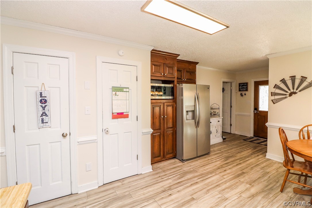 2210 Mill Road Powhatan, VA 23139 - Photo 10 of 36 a view of a kitchen with refrigerator and wooden floor