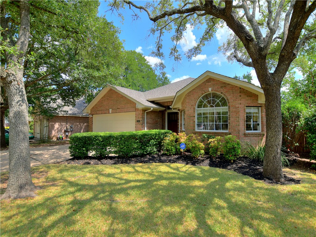 7117 Ridge Oak Road Austin, TX 78749 - Photo 1 of 1 a front view of a house with a yard