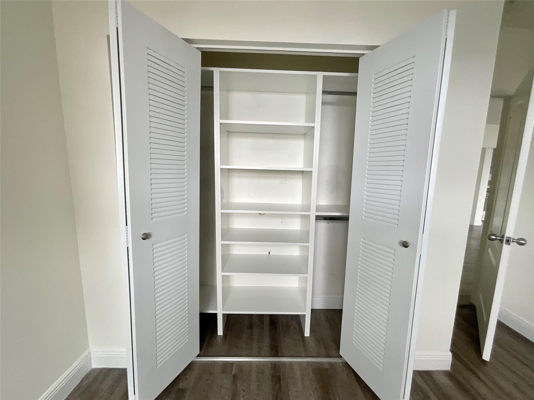 16900 North Bay Road, Unit 21211 Sunny Isles Beach, FL 33160 - Photo 5 of 30 a view of walk in closet with empty racks