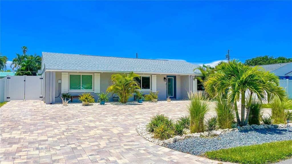 15914 2nd Street East Redington Beach, FL 33708 - Photo 1 of 1 a view of a house with a patio