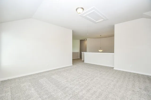 a bath tub sitting next to a white toilet