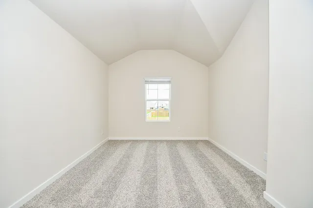 a bathroom with a granite countertop sink mirror and a bath tub