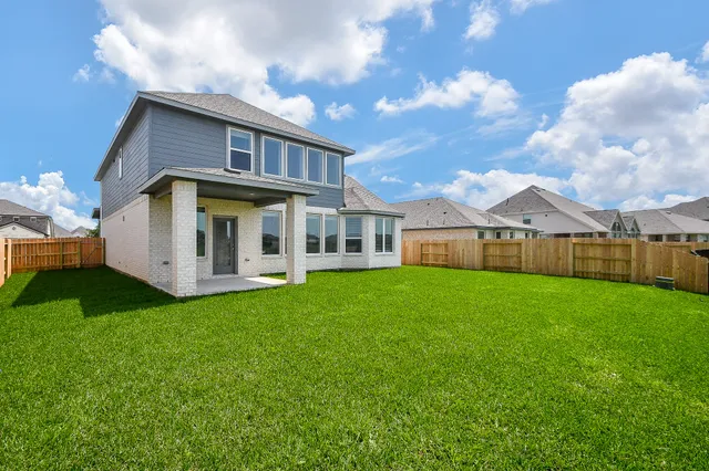 a view of a lake with a big yard