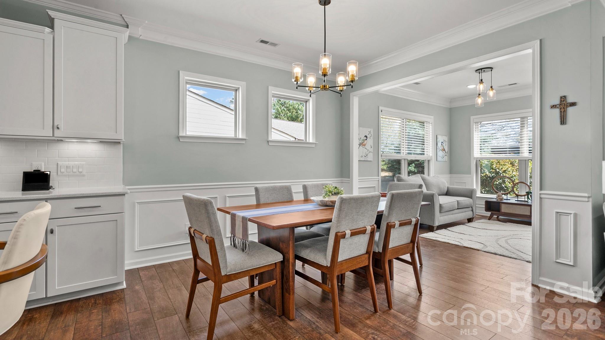 952 Kirby Drive Fort Mill, SC 29715 - Photo 13 of 42 a view of a dining room with furniture window and wooden floor