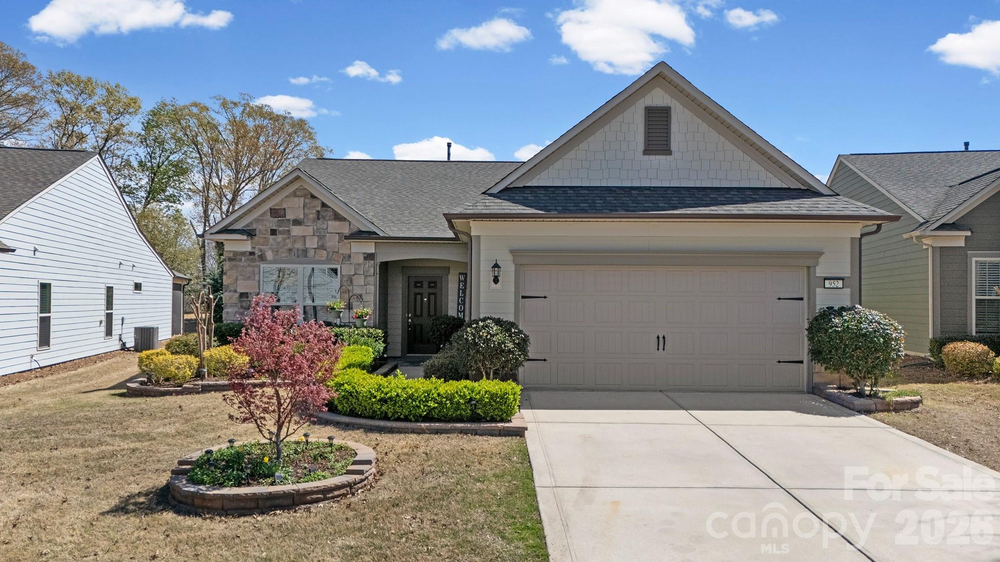 952 Kirby Drive Fort Mill, SC 29715 - Photo 3 of 42 a front view of a house with garden