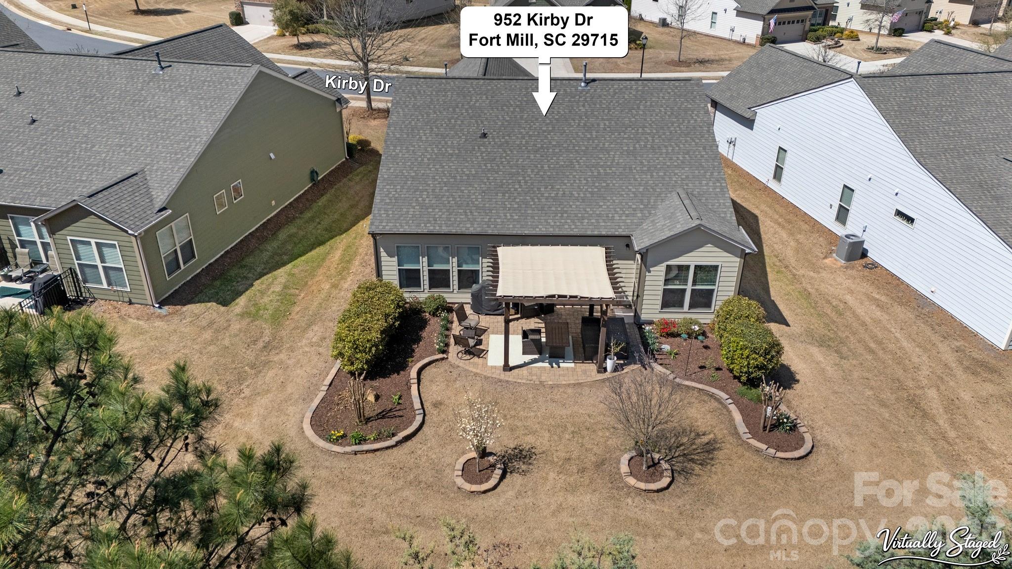 952 Kirby Drive Fort Mill, SC 29715 - Photo 36 of 42 an aerial view of a house with swimming pool and sitting space