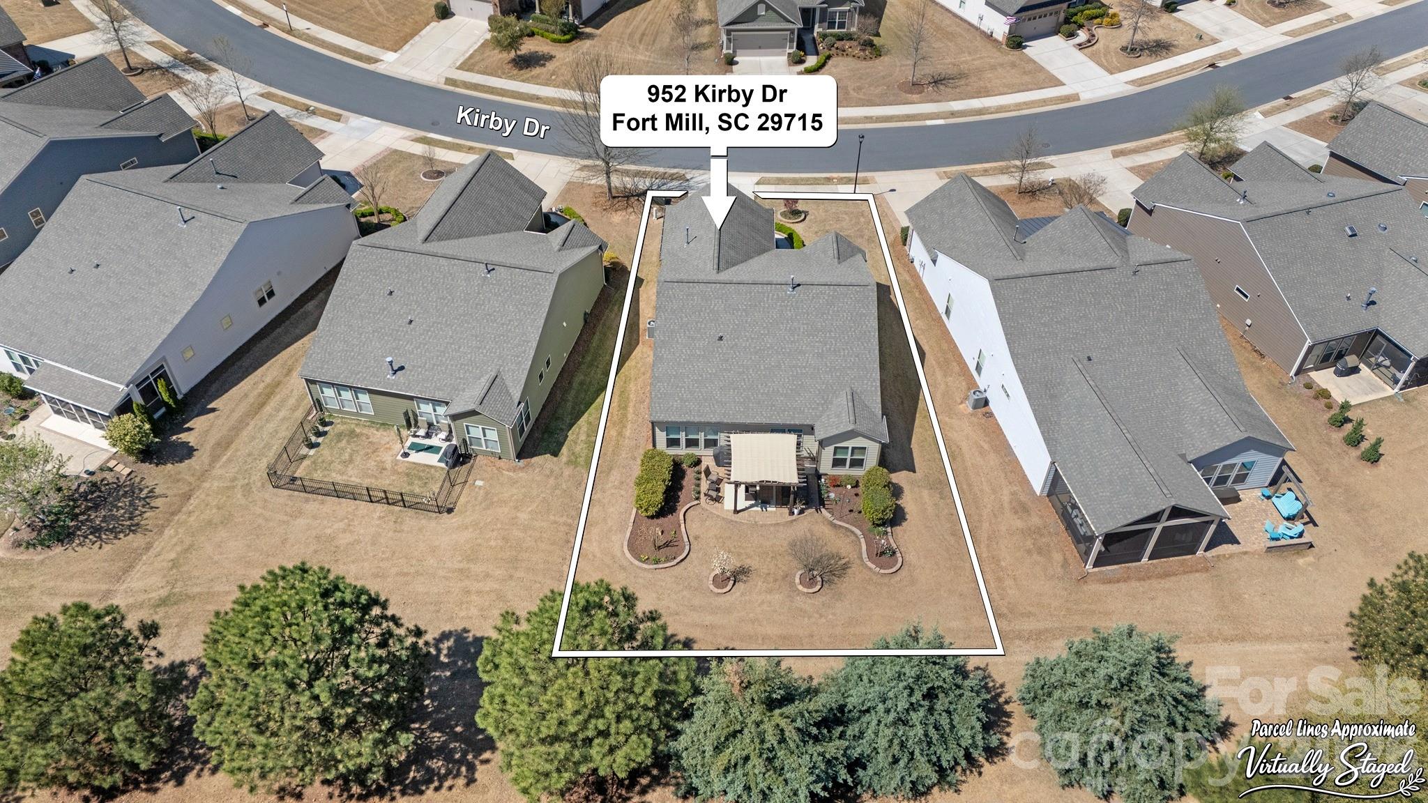952 Kirby Drive Fort Mill, SC 29715 - Photo 38 of 42 an aerial view of residential houses with outdoor space